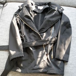 Black Michael Kors Trench with gold details.